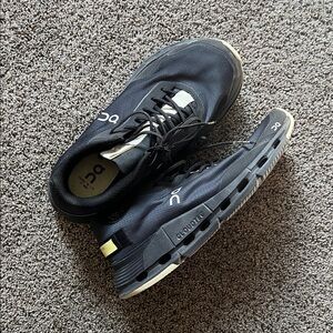 On Running Women's Black and White Athletic Shoes